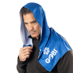 Man wearing the chillwave hooded towel, front view.