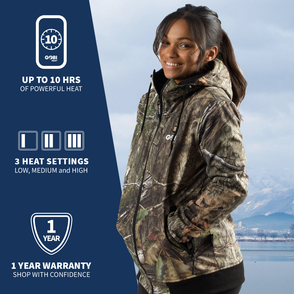 A woman wearing GOBI's women's shadow heated hunting hoodie. She is standing in front of a landscape, with information about the product on the left side of the image.
