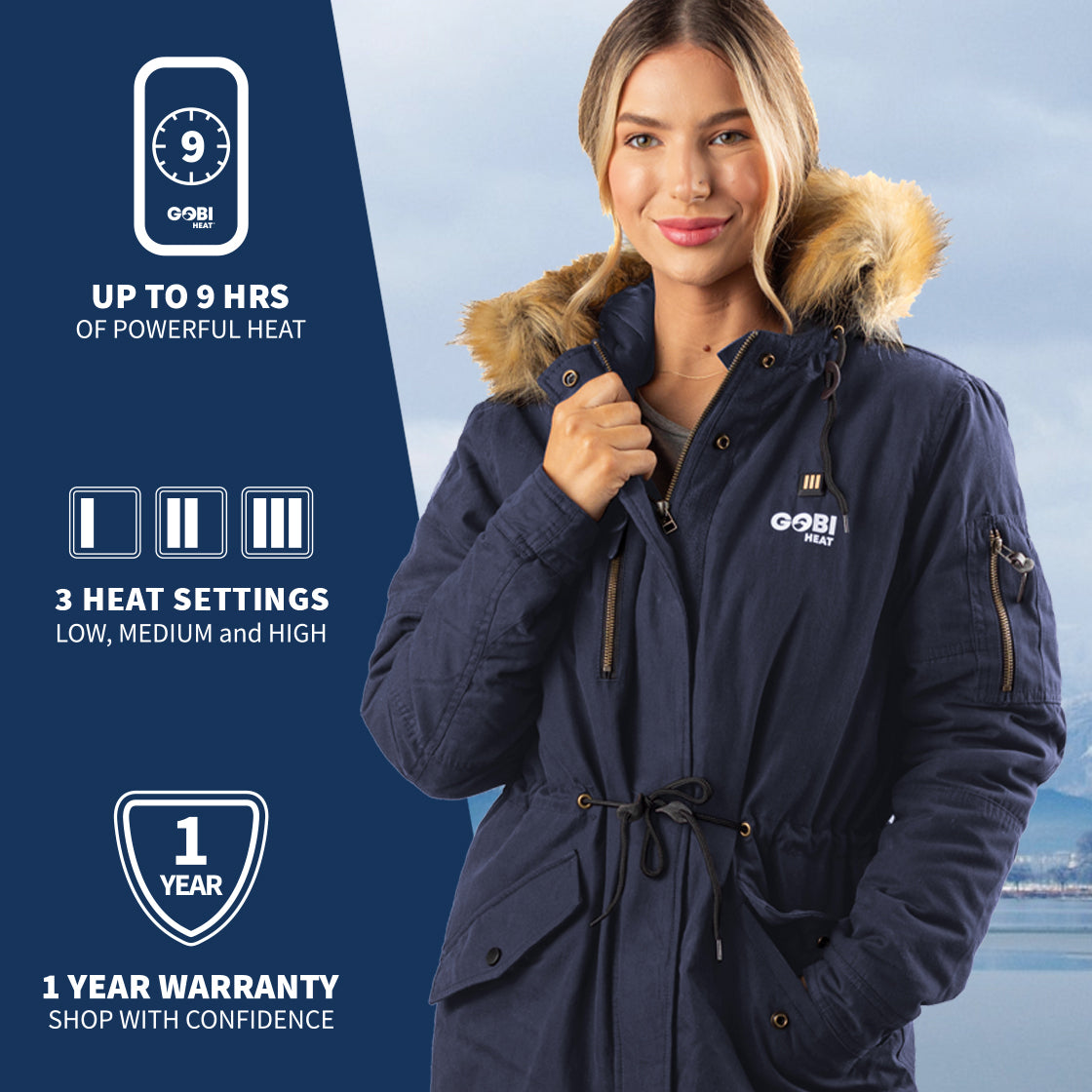 A woman wearing GOBI's Women's Terra heated parka. She is standing in front of a landscape, with information about the product on the left side of the image.