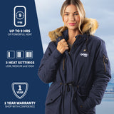 A woman wearing GOBI's Women's Terra heated parka. She is standing in front of a landscape, with information about the product on the left side of the image.